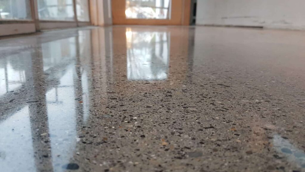 Epoxy coating on concrete floor protecting from moisture in industrial building
