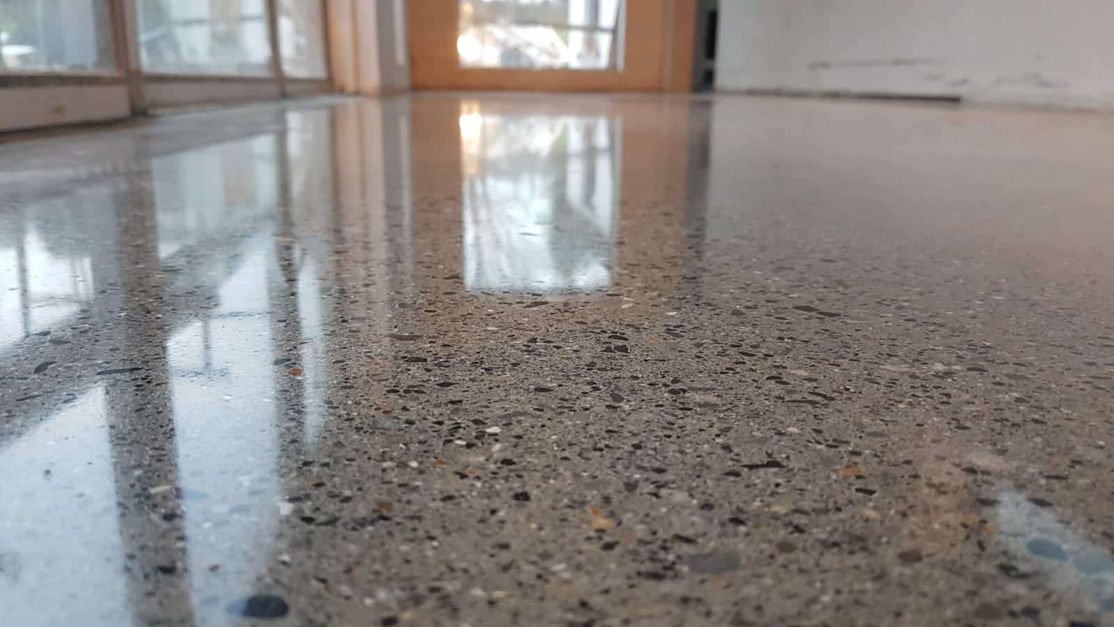 Epoxy coating on concrete floor protecting from moisture in industrial building