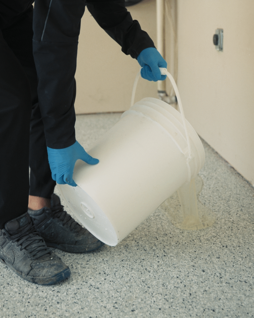 Prime Concrete Coatings installing epoxy flake flooring system