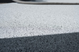 Epoxy Flake Flooring System installed in Kelowna garage by Prime Concrete Coatings
