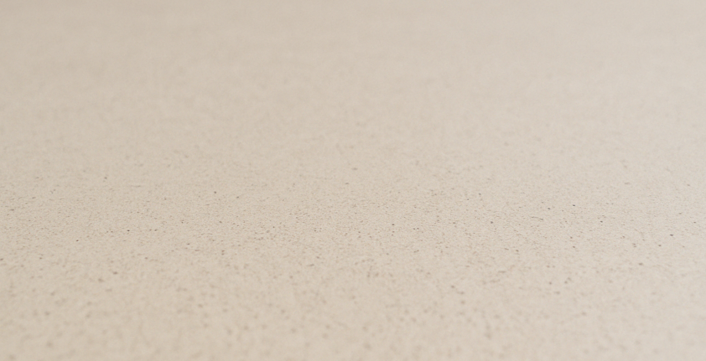 cream_finish_low_angle_1400x716 Image showing a smooth, light-colored cream finish for polished concrete, highlighting a subtle, refined surface with minimal texture.